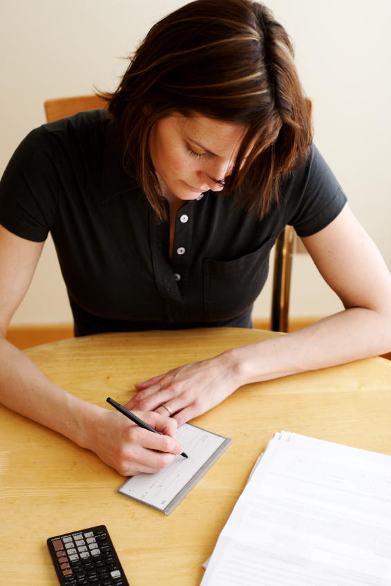 Woman paying bills